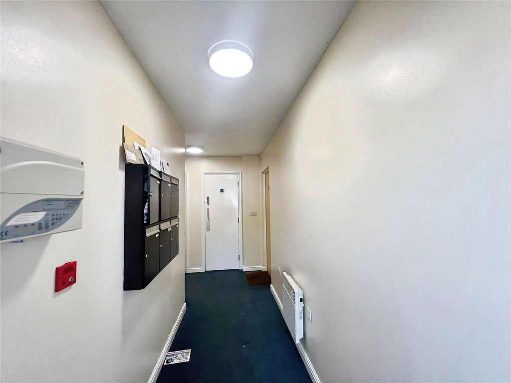 Property photo 3 of 12 Communial Hallway