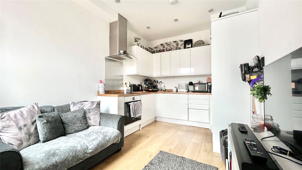 Property photo 2 of 6 Living Area