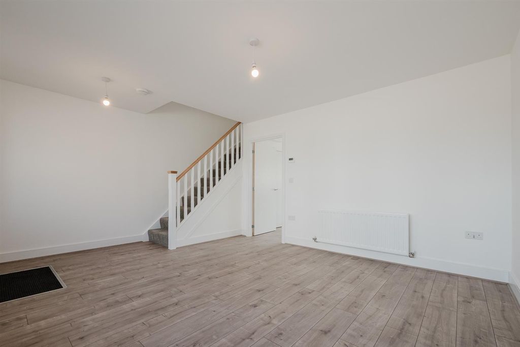 Property photo 3 of 13 Living Area