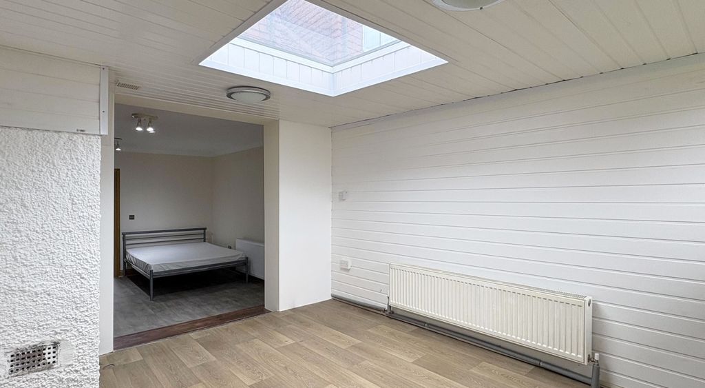 Property photo 1 of 15 Bright Bedroom With Unique Skylight Feature...