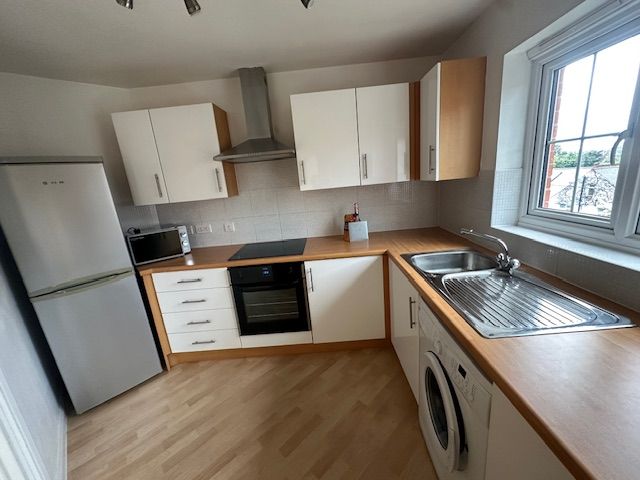 Property photo 3 of 9 Kitchen