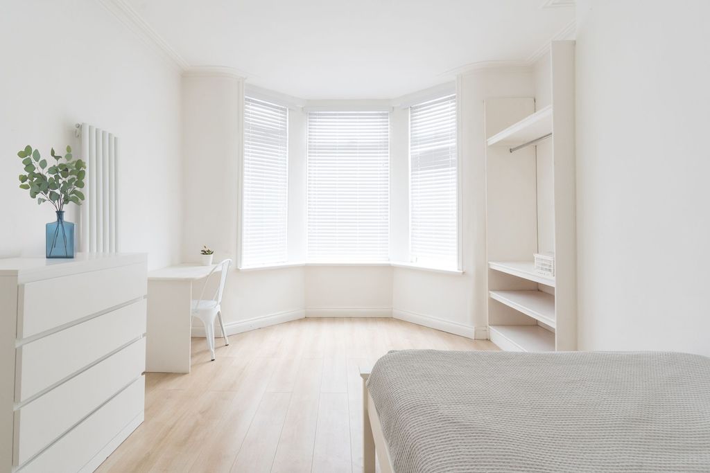 Property photo 2 of 6 Bright And Airy Bedroom With Large Windows Dressed...