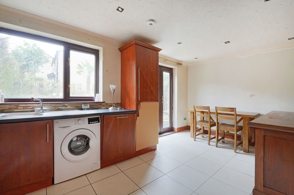 Property photo 2 of 24 Dining Kitchen