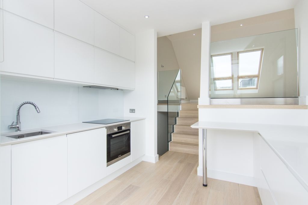 Property photo 1 of 7 Kitchen