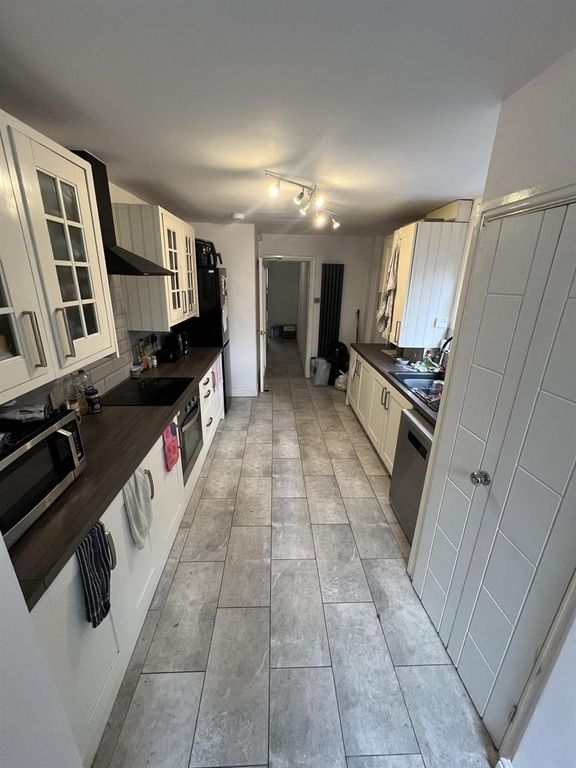 Property photo 2 of 15 Bright Modern Galley Kitchen With Ample Storage...