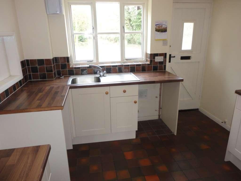 Property photo 3 of 9 Kitchen