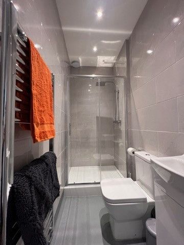 Property photo 1 of 16 Bright, Modern Bathroom With A Glass-Enclosed Walk...