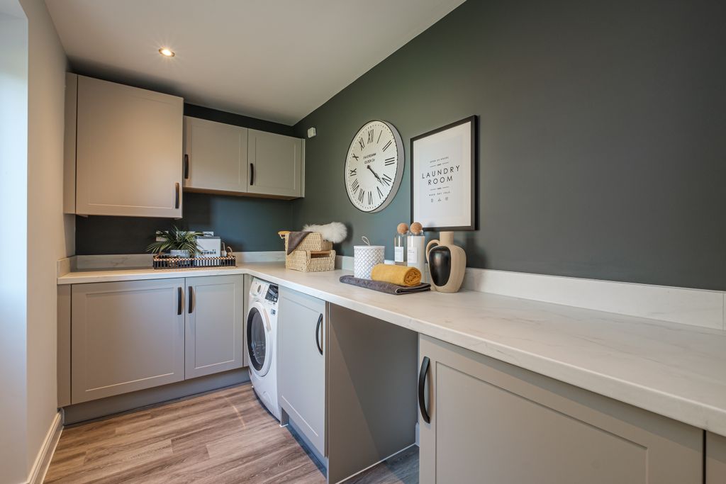 Property photo 3 of 9 Grey Utility Room In An Exeter Home