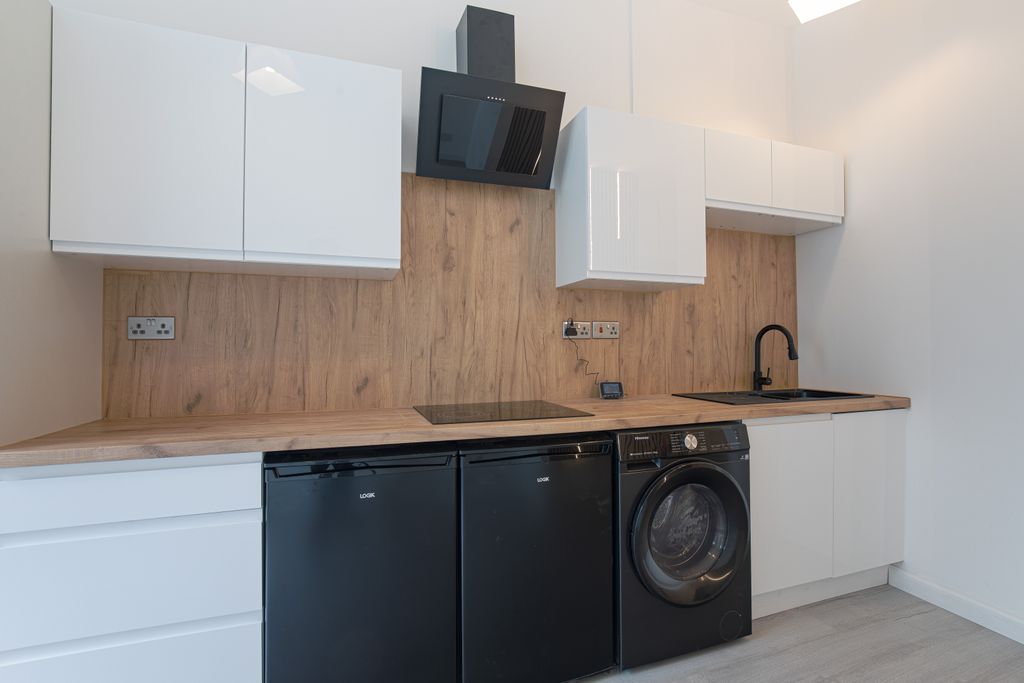Property photo 1 of 8 Kitchen