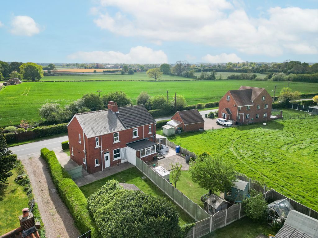 Property photo 2 of 11 Aerial Rear