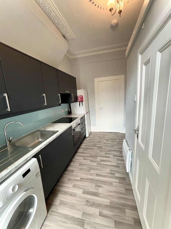 Property photo 2 of 8 Kitchen