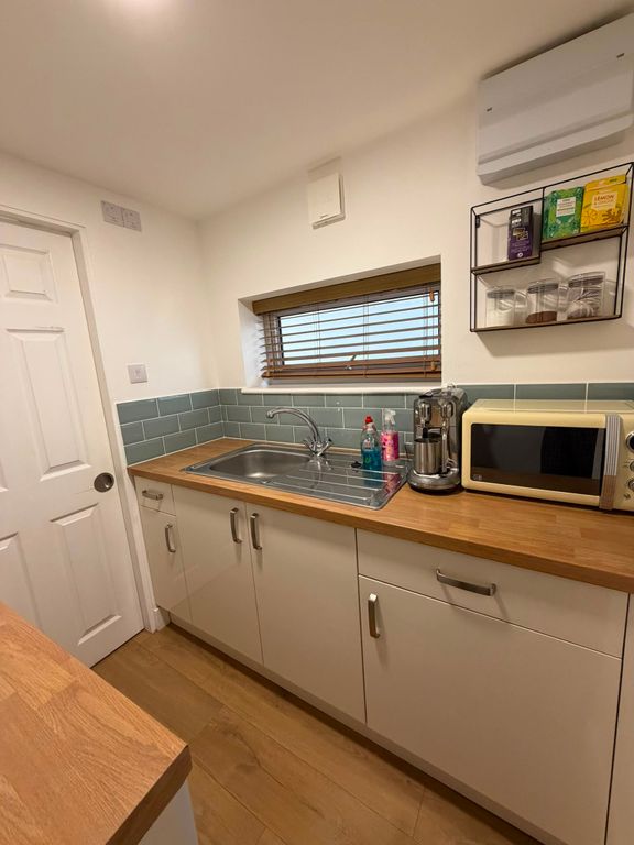 Property photo 3 of 9 Kitchen