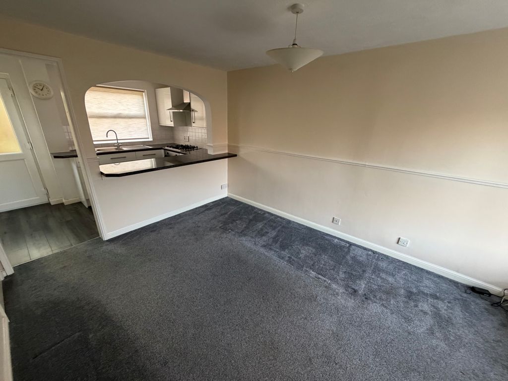 Property photo 3 of 8 Front