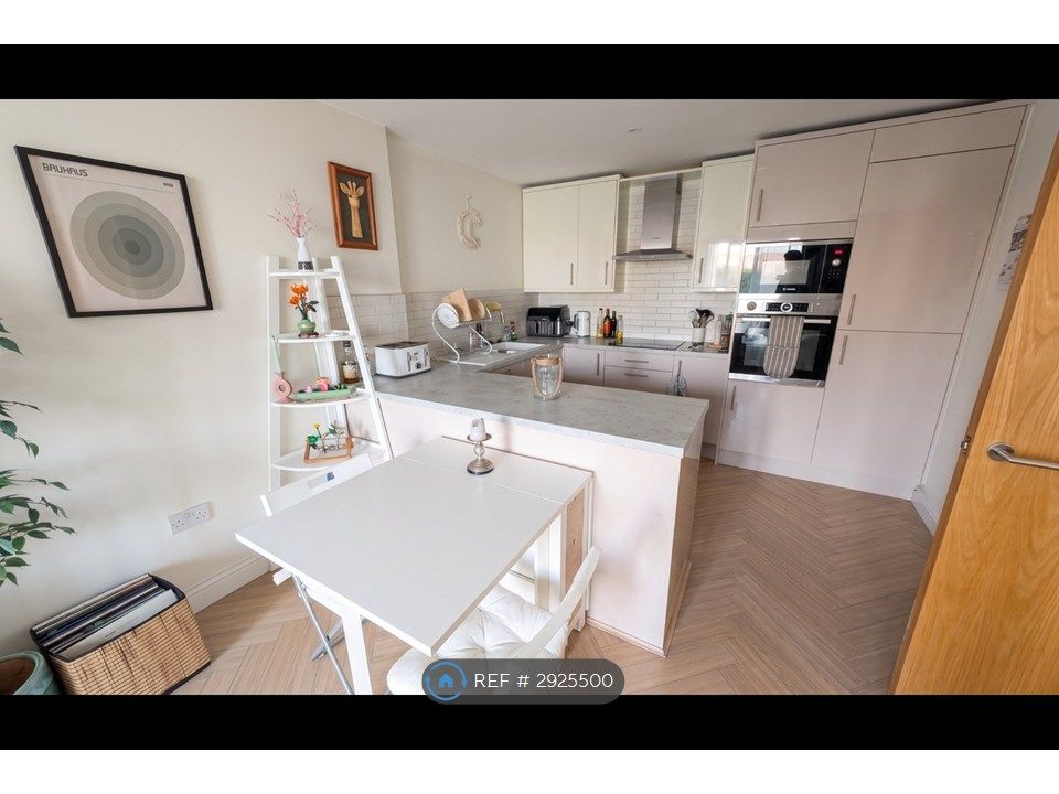 Property photo 2 of 7 Dining Area & Kitchen