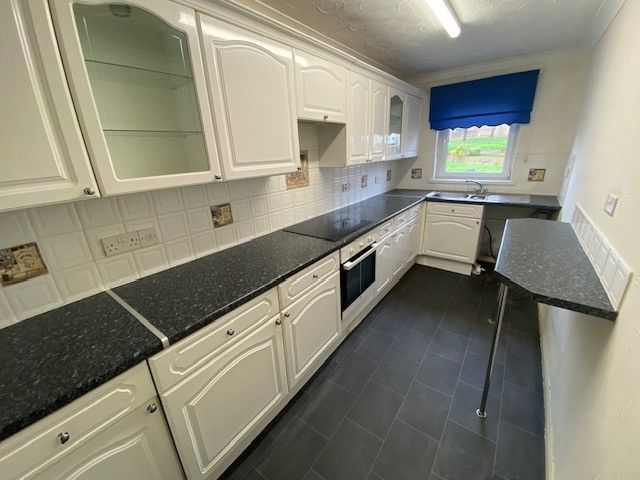 Property photo 3 of 8 Kitchen