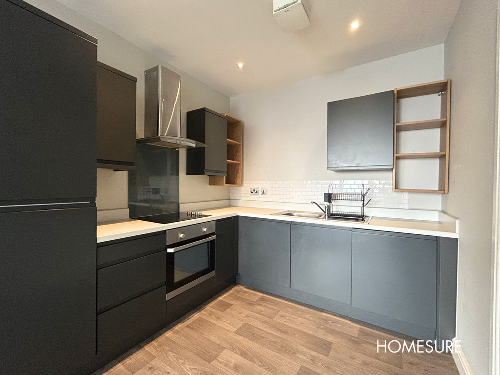 Property photo 3 of 8 Kitchen