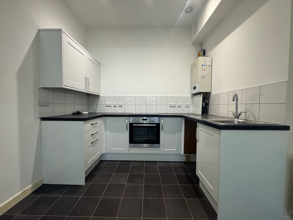 Property photo 2 of 6 Kitchen