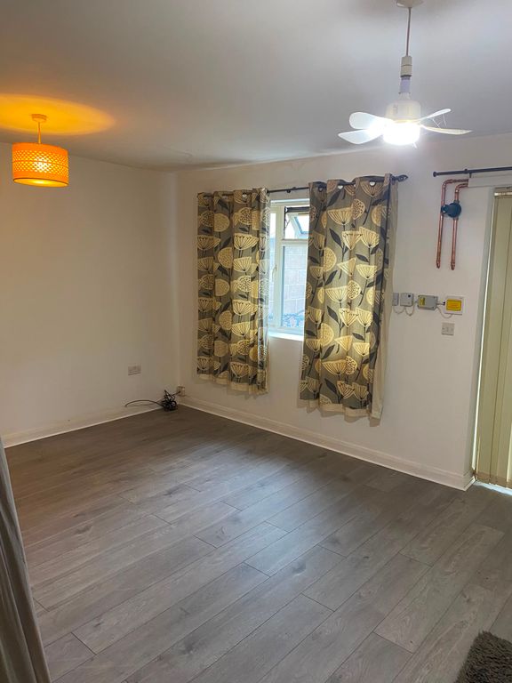 Property photo 3 of 12 Bedroom/Living Room