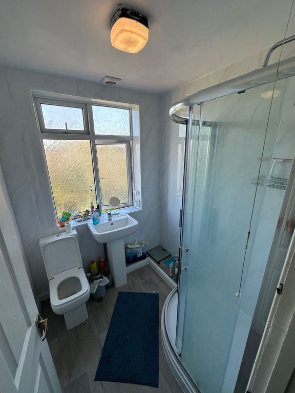 Property photo 3 of 8 Bright Bathroom With Modern Corner Shower Unit....