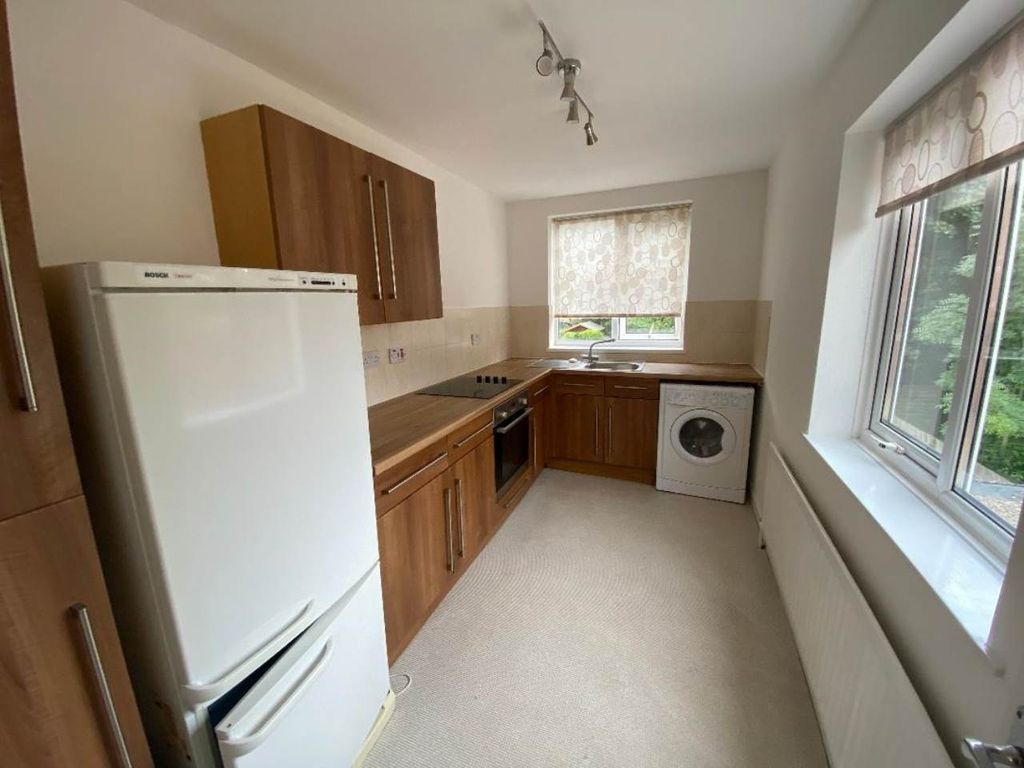 Property photo 3 of 8 Kitchen