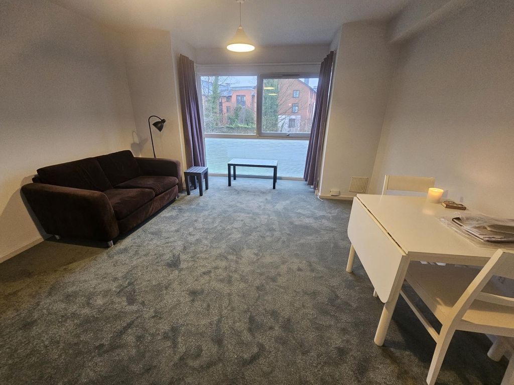 Property photo 1 of 8 Spacious, Carpeted Living Room With A Large Window...