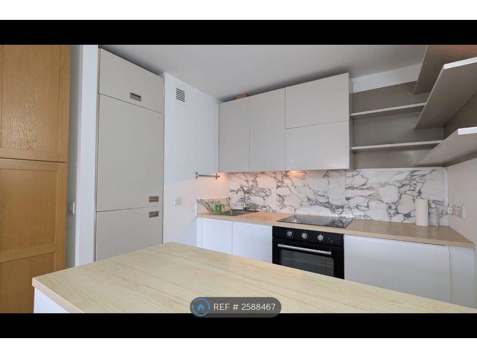Property photo 3 of 13 Kitchen