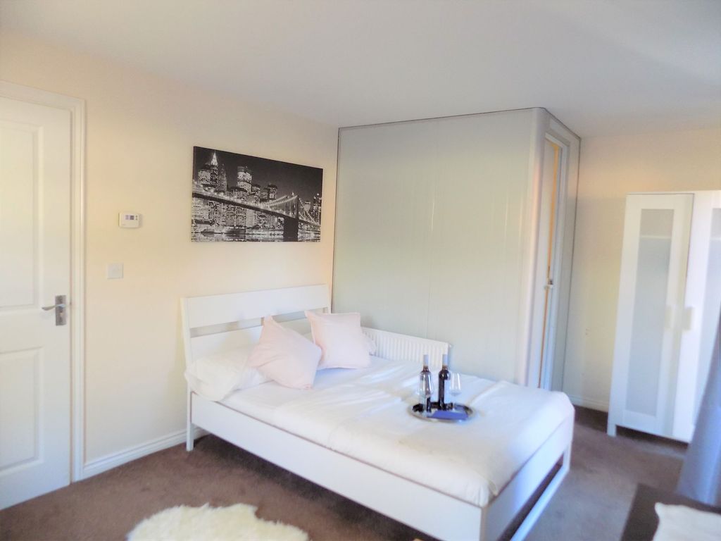 Property photo 2 of 24 Bright, Modern Bedroom With A Double Bed Dressed i...