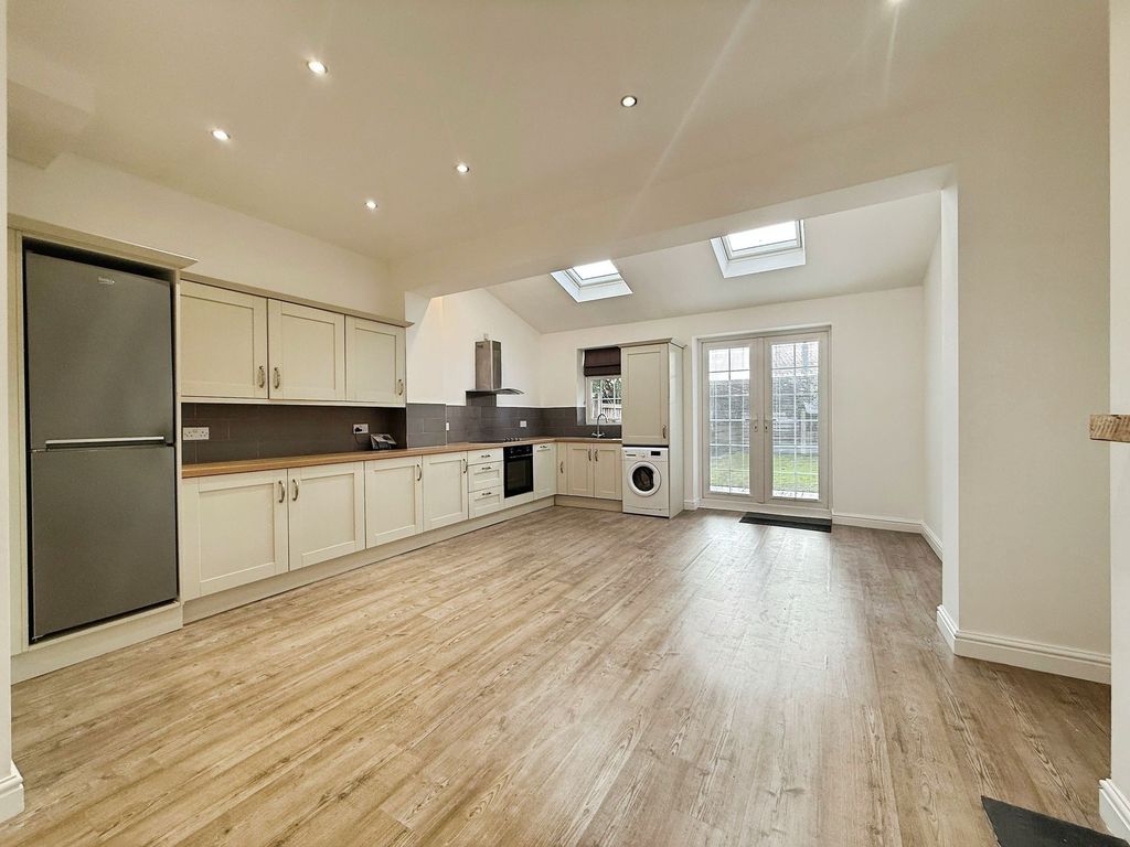 Property photo 2 of 17 Kitchen Family Room