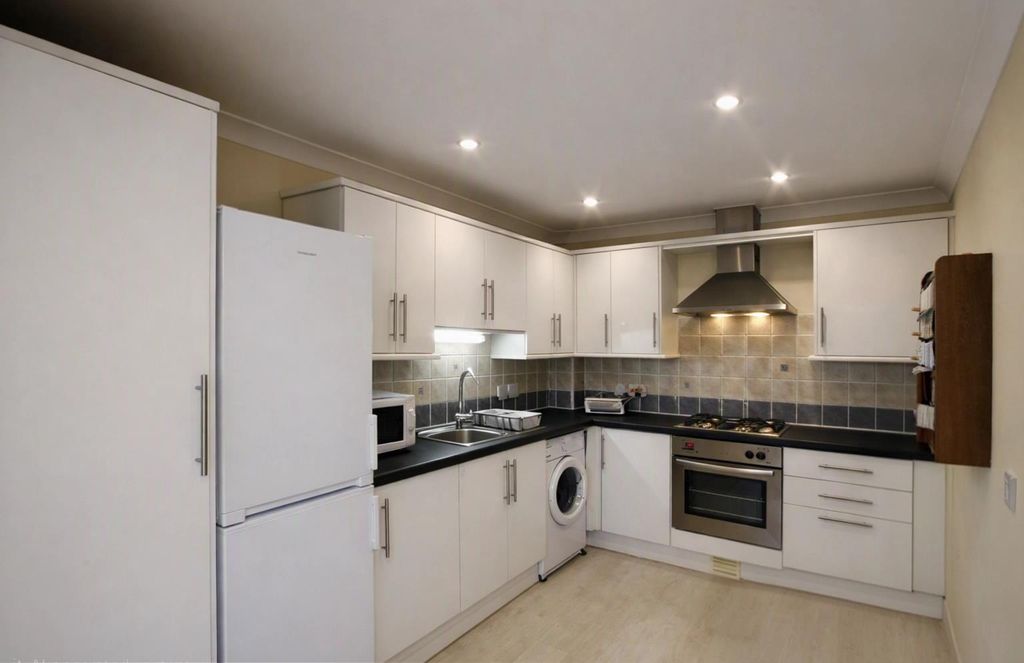 Property photo 3 of 12 Kitchen