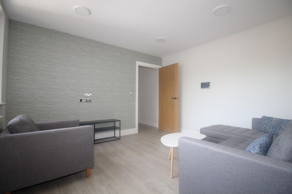 Property photo 2 of 12 Living Area