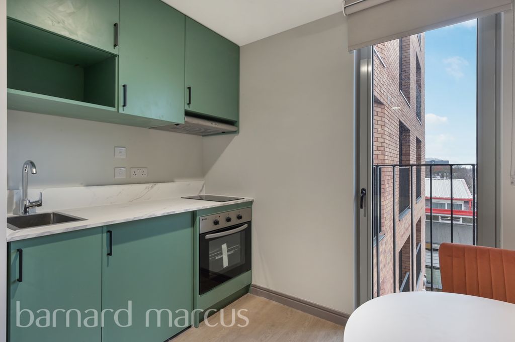 Property photo 3 of 7 Kitchen