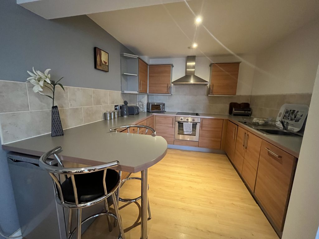 Property photo 2 of 8 Kitchen