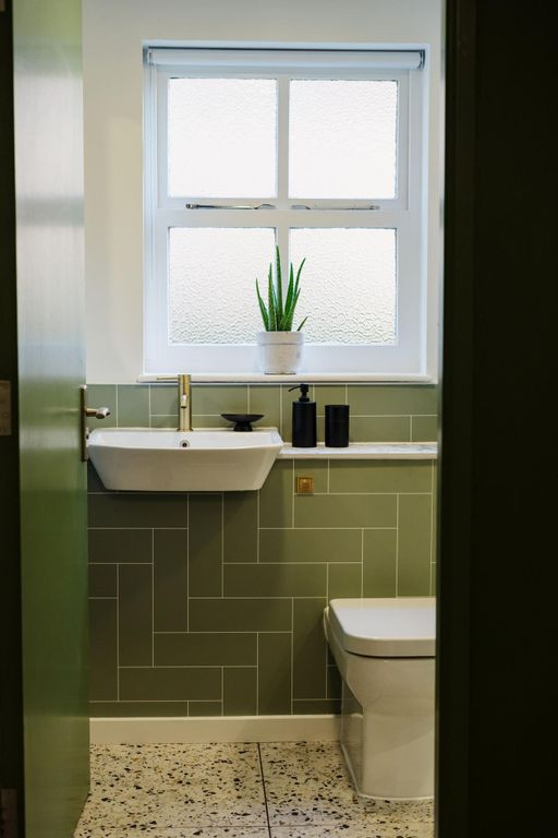 Property photo 3 of 4 Bright And Stylish Single Toilet With Modern Green...