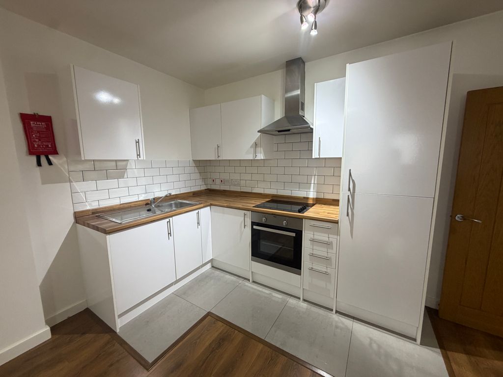 Property photo 2 of 8 Kitchen