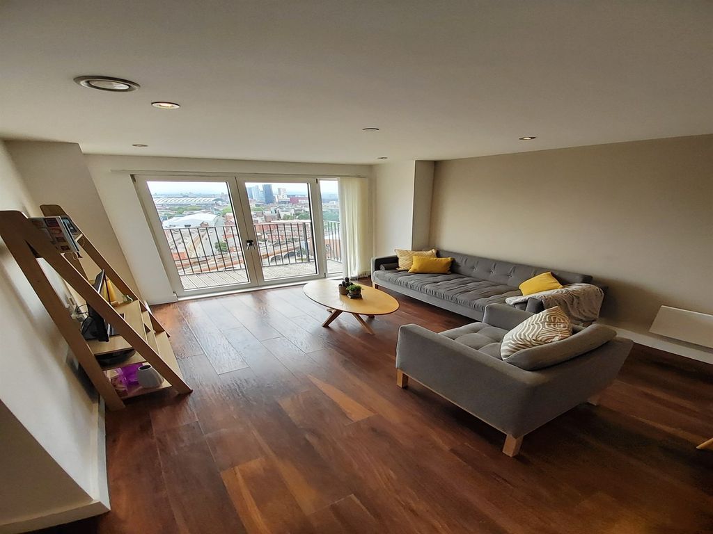 Property photo 3 of 12 Living Area