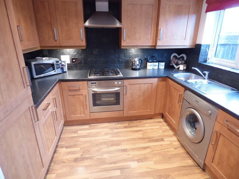 Property photo 2 of 6 Kitchen