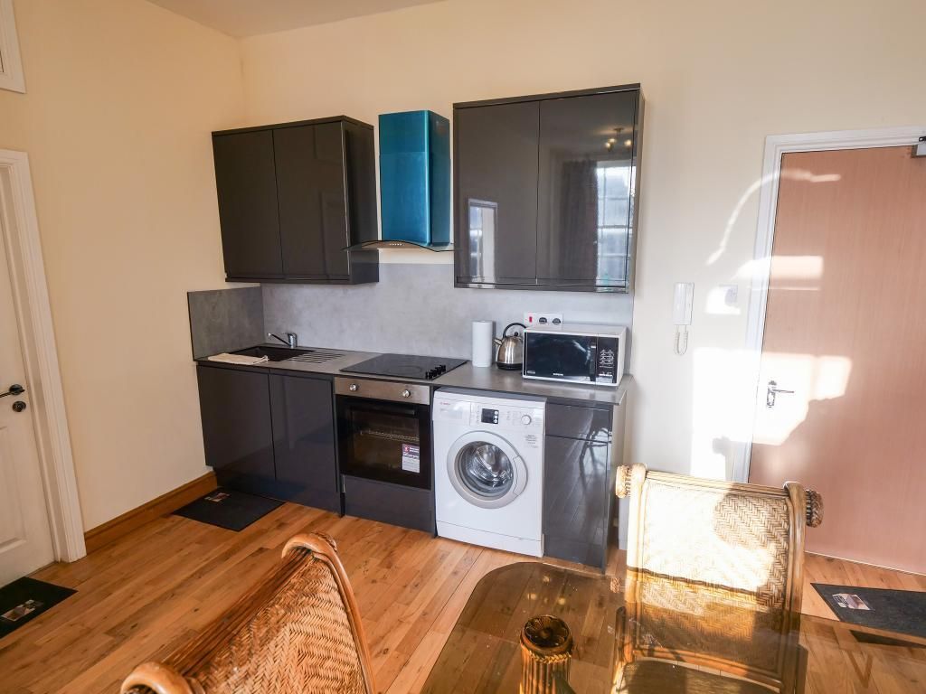 Property photo 3 of 7 Kitchen Area