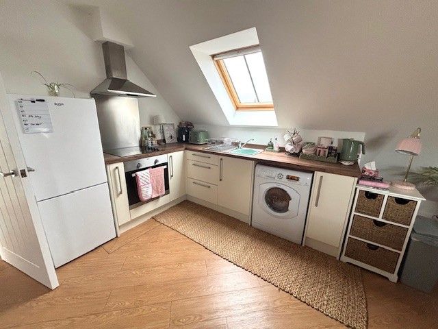 Property photo 3 of 7 Kitchen