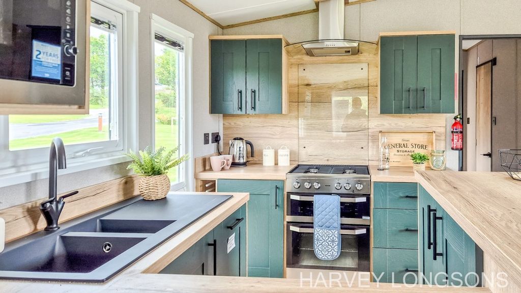 Property photo 3 of 23 Stylish Green Fitted Kitchen In Abi Ingleton Static Caravan