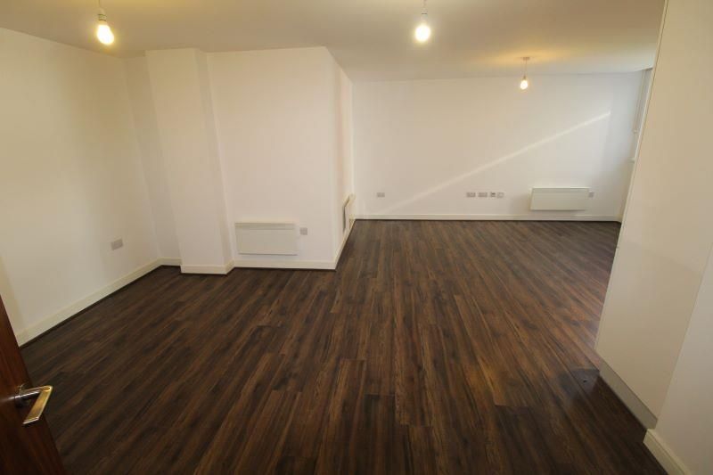 Property photo 2 of 6 Living Area.Jpg