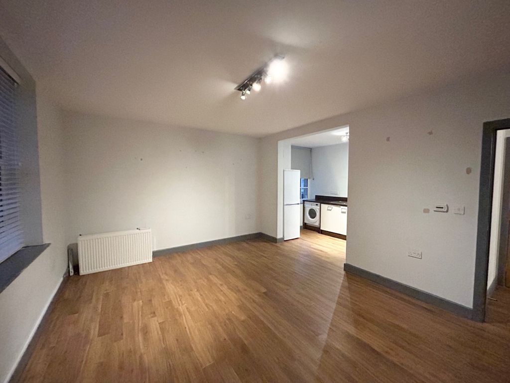 Property photo 3 of 12 Living Area