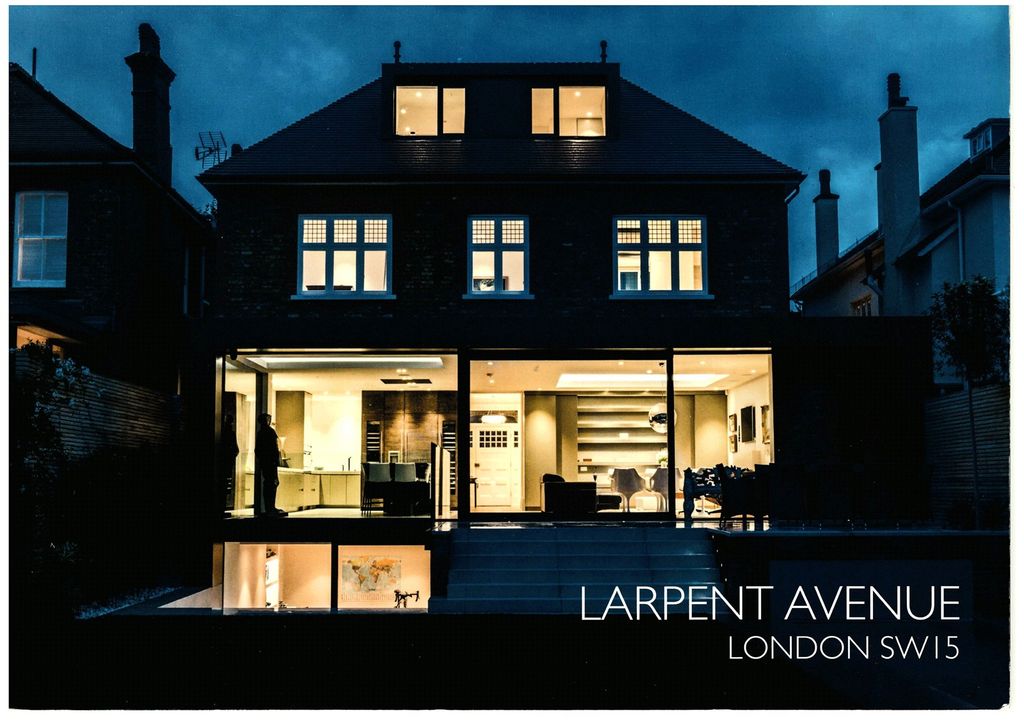 Property photo 2 of 13 Night Exterior