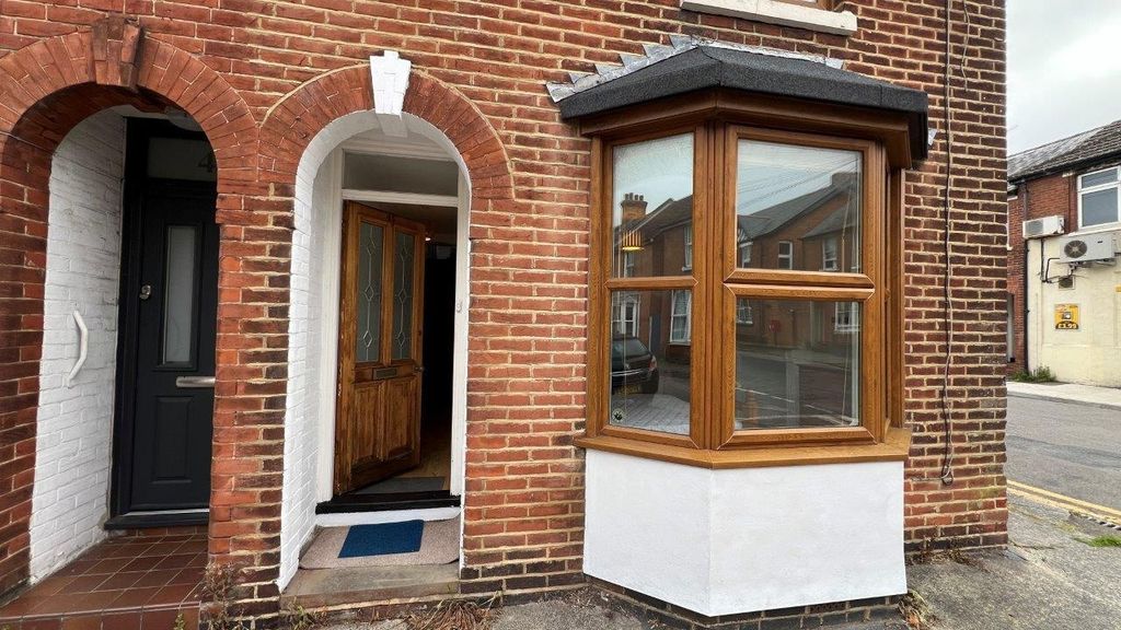 Property photo 1 of 48 Charming Red Brick Exterior With Bay Window...