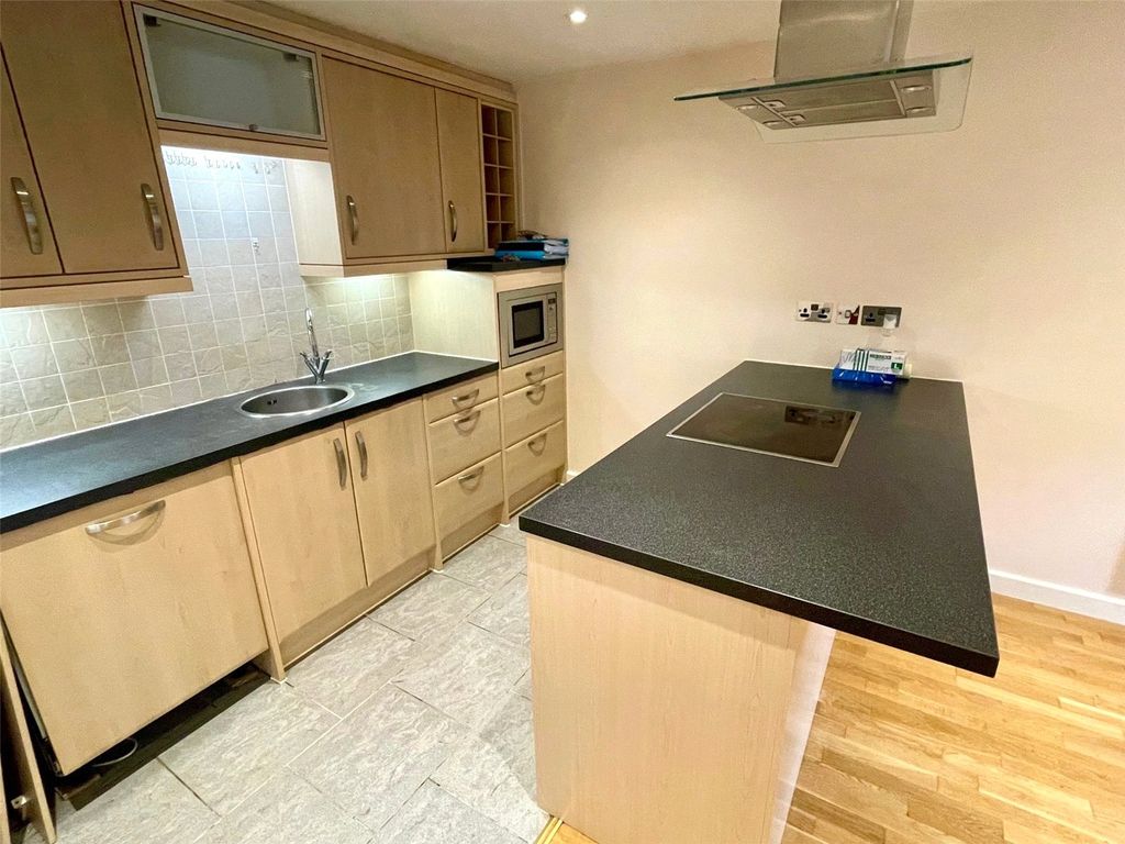 Property photo 3 of 16 Kitchen