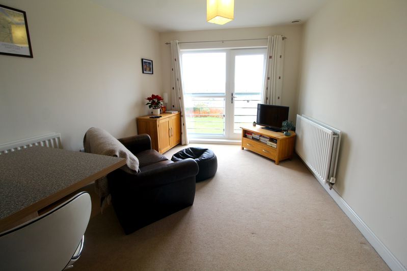 Property photo 2 of 7 Living Room Area