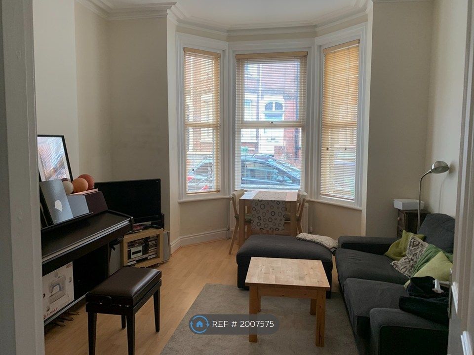 Property photo 3 of 13 Living Room 1