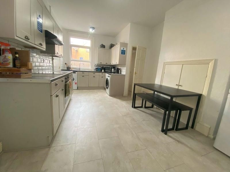 Property photo 3 of 17 Modern Kitchen Dining Space