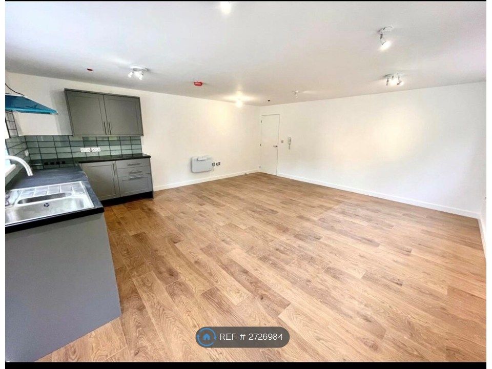 Property photo 2 of 7 Kitchen Living Room