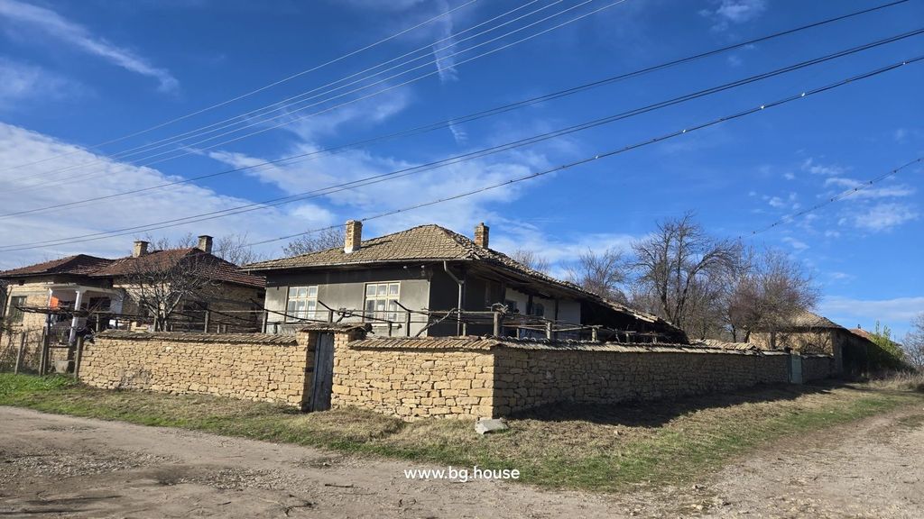 Property photo 2 of 51 Corner Perspective Showing Stone Wall Surrounding A Bulgarian House With Tiled Roof And Dirt Road