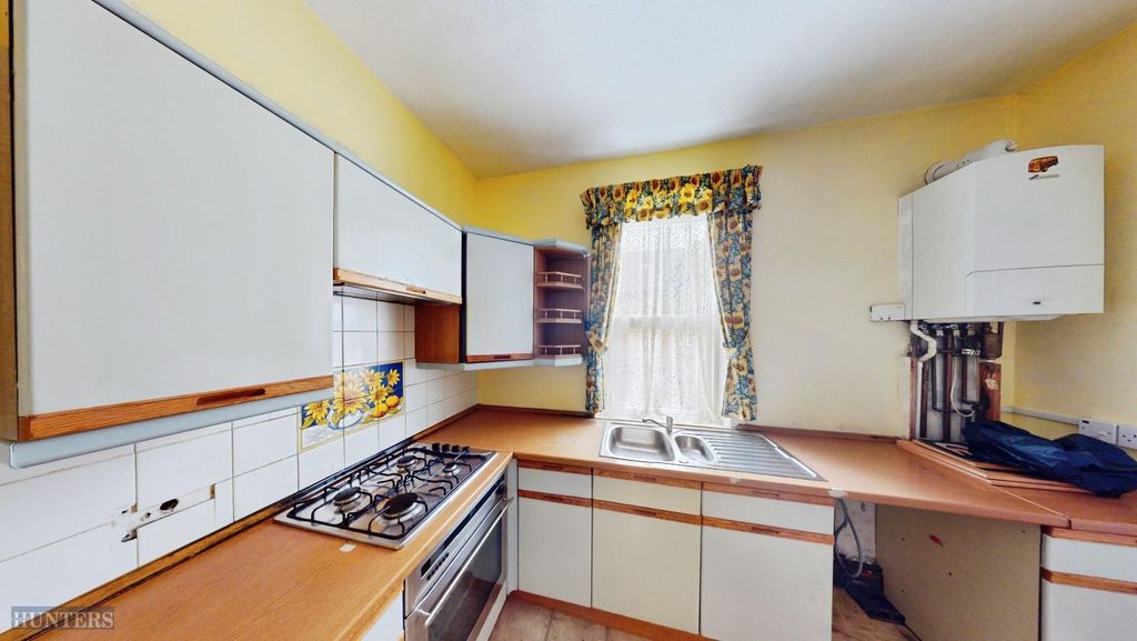 Property photo 3 of 13 Kitchen